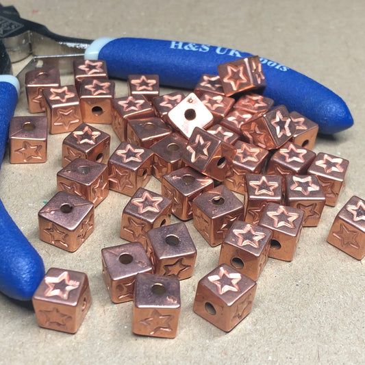 Copper star cube charms