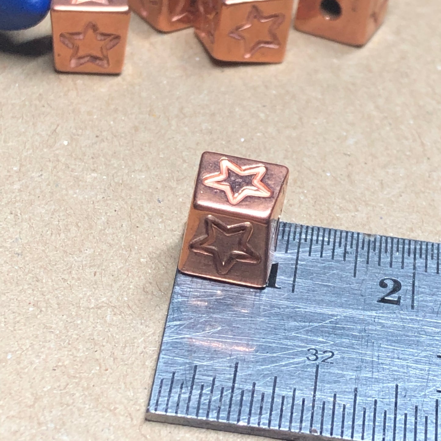 Copper star cube charms