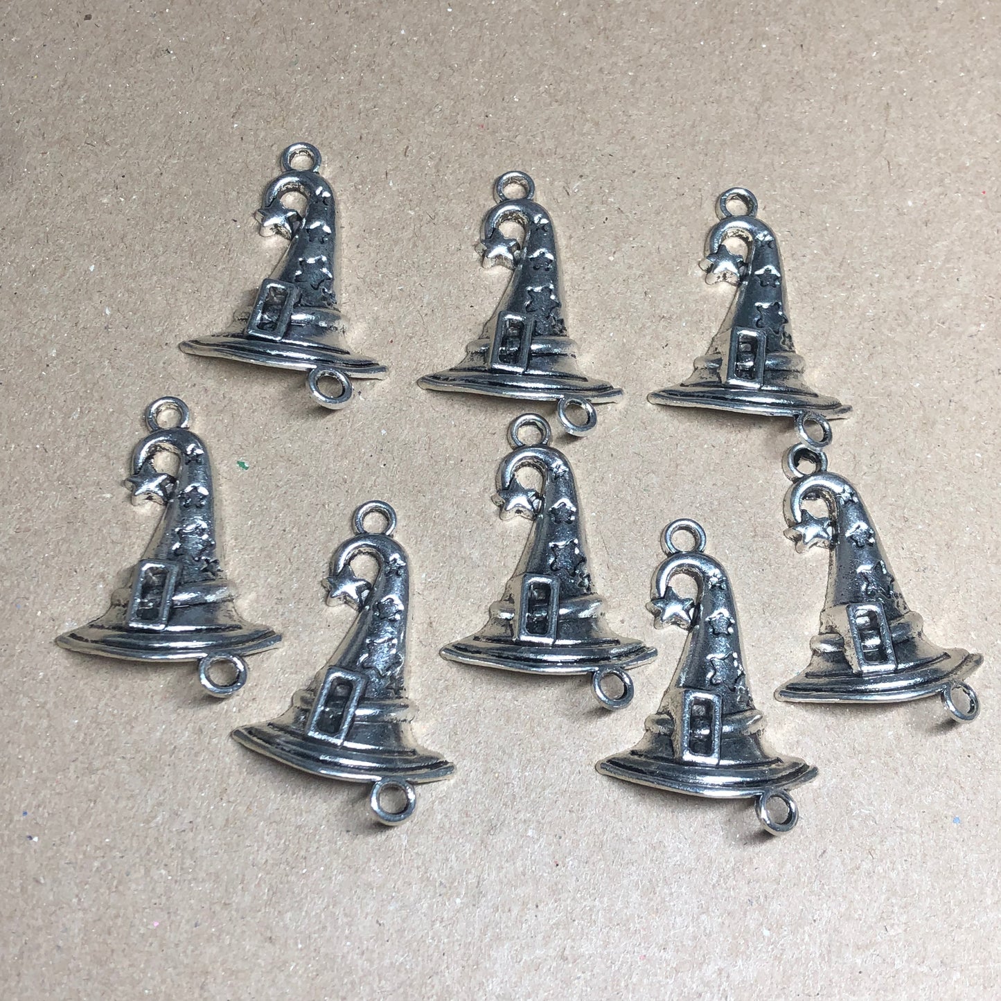 Eight wizard hat charms