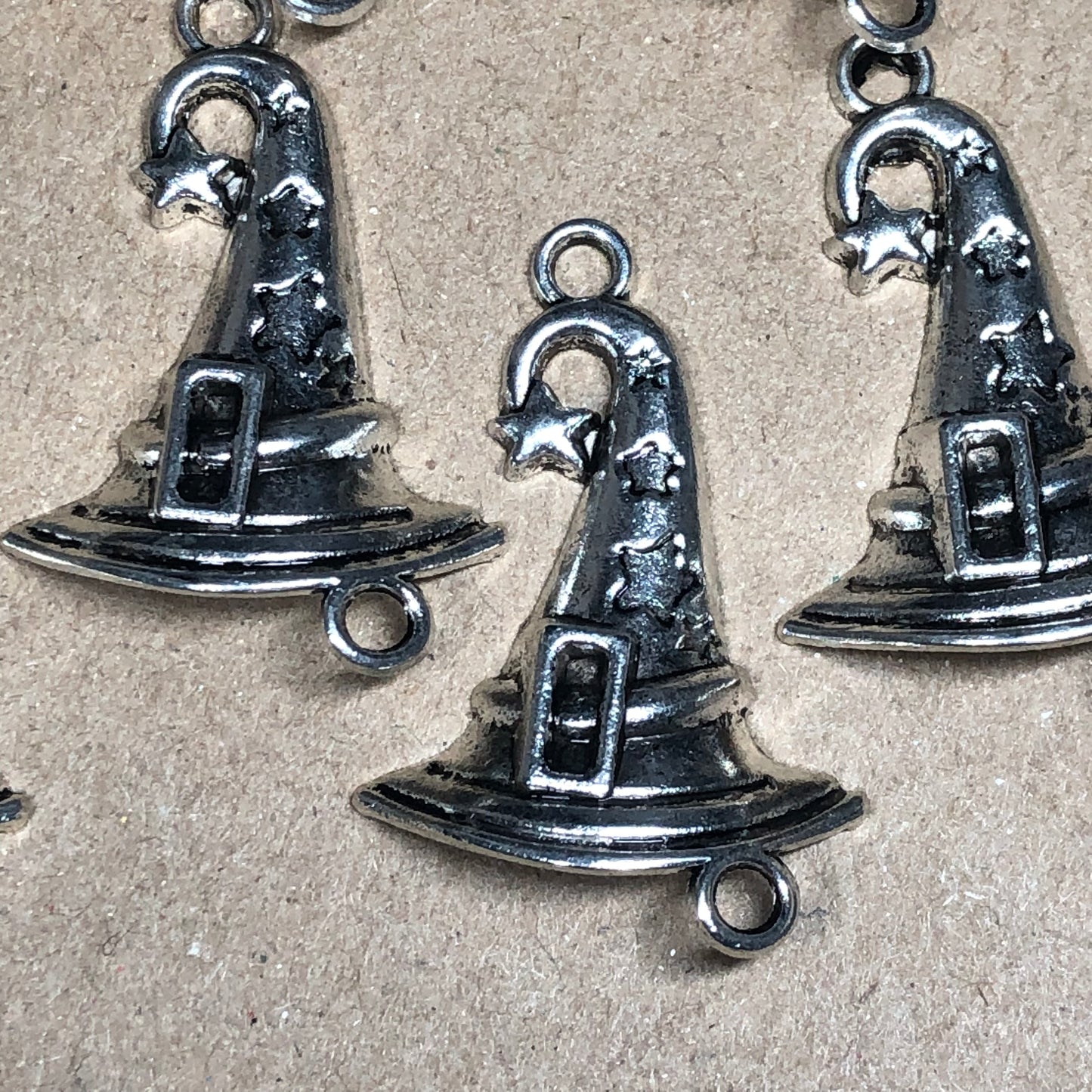 Eight wizard hat charms