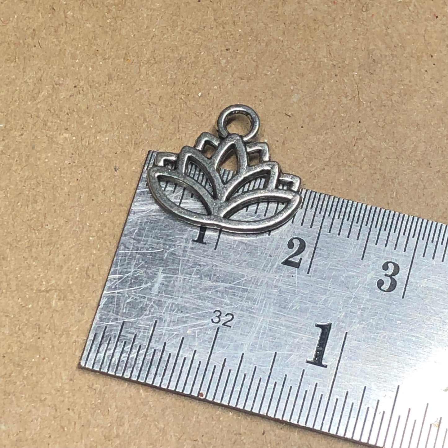 Twelve lotus flower charms