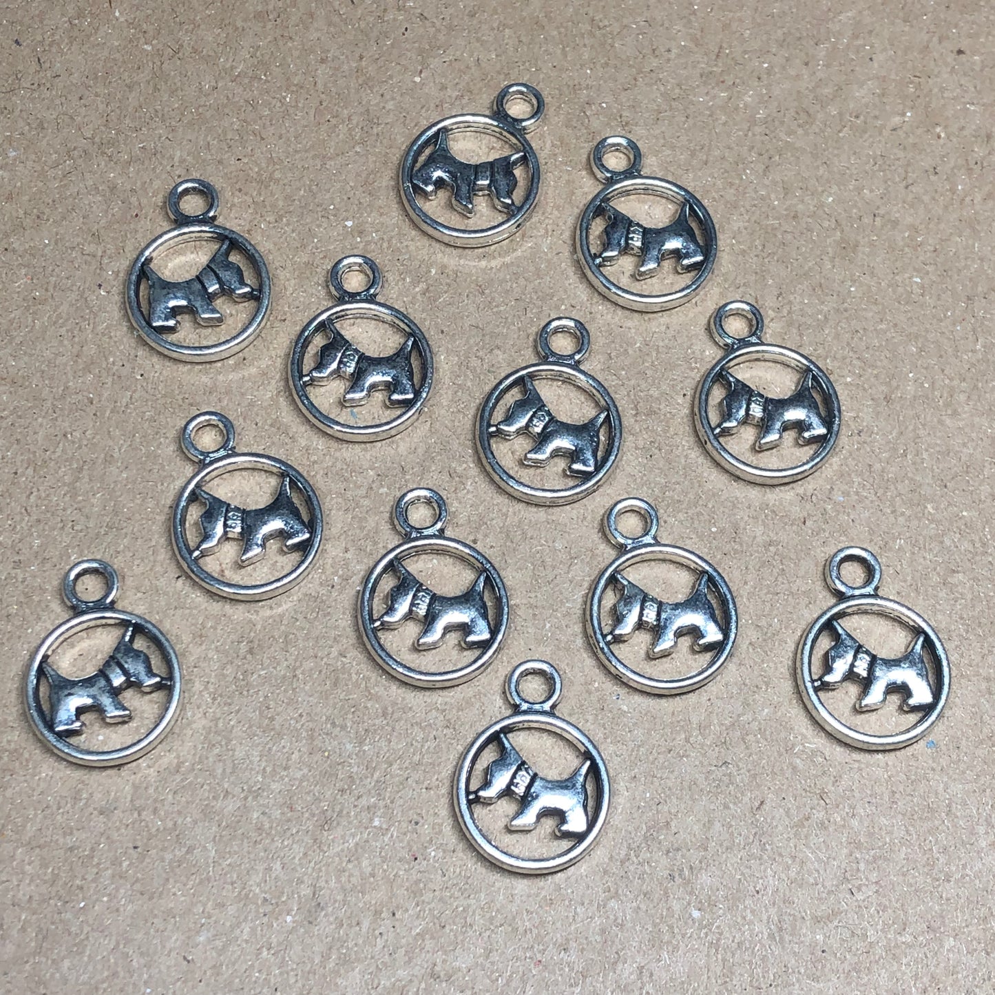 Twelve Scottie dog charms