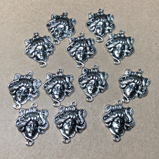 Twelve goddess head connector charms