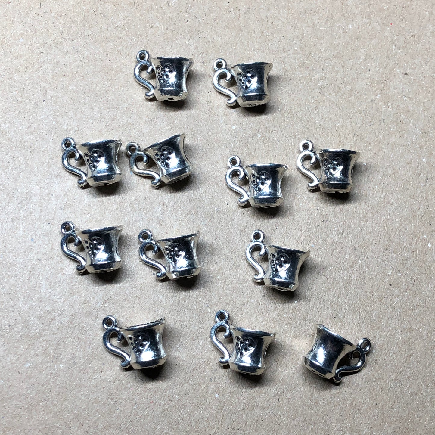 Twelve coffee mug charms