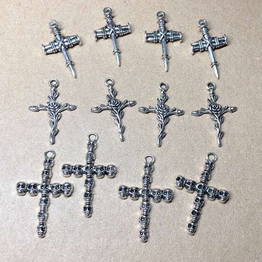 Twelve mixed crucifix cross charms