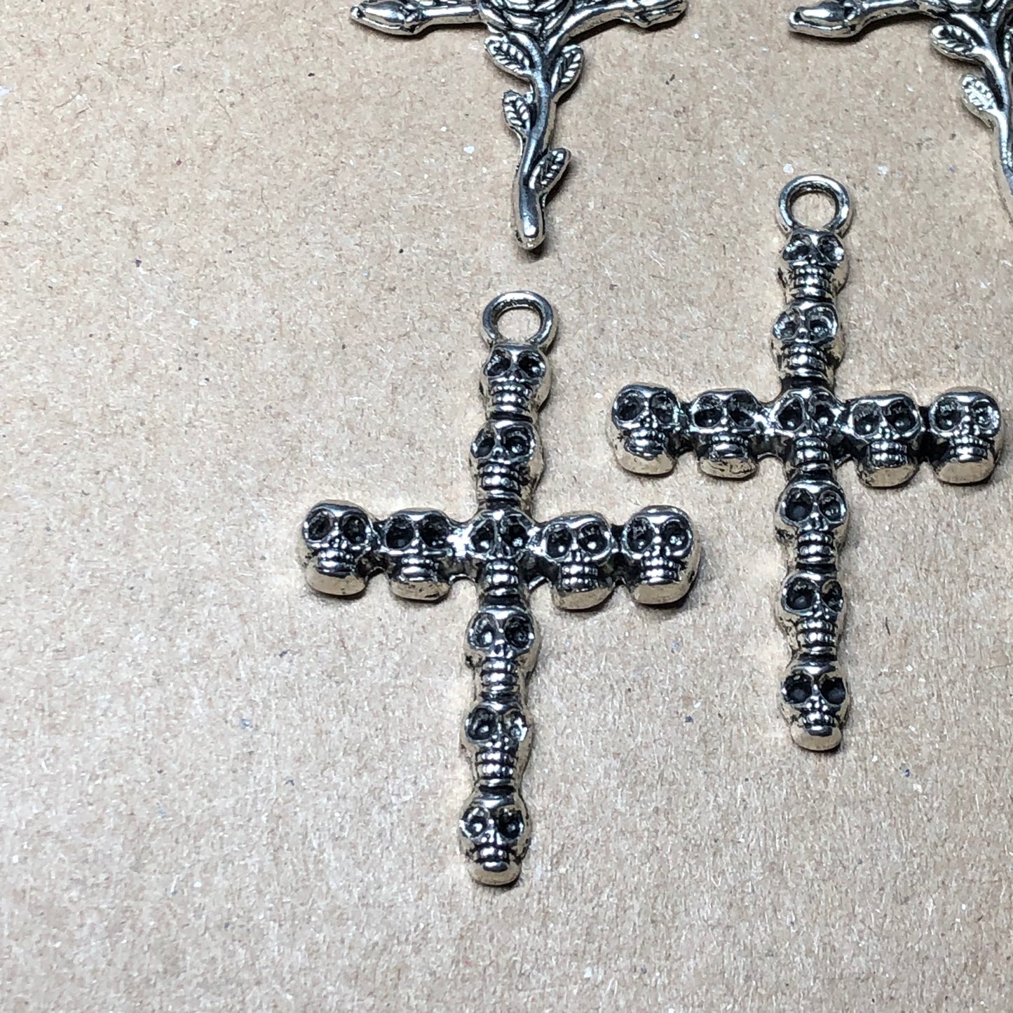 Twelve mixed crucifix cross charms