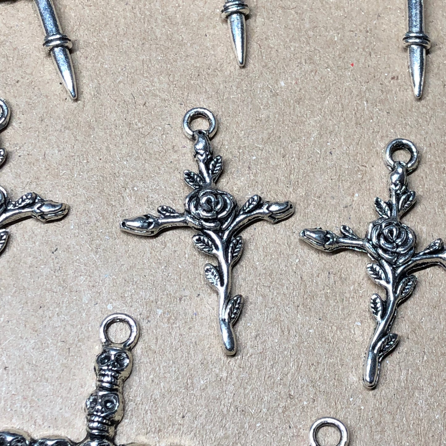 Twelve mixed crucifix cross charms