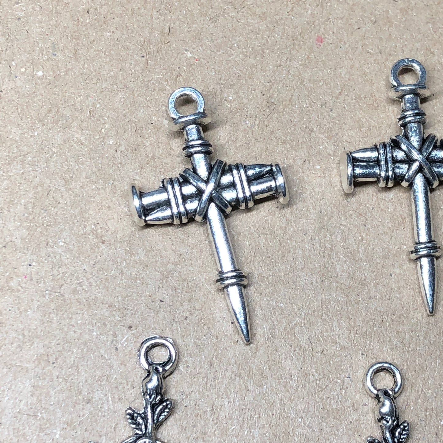 Twelve mixed crucifix cross charms