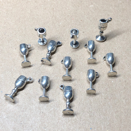 Twelve wine goblet charms