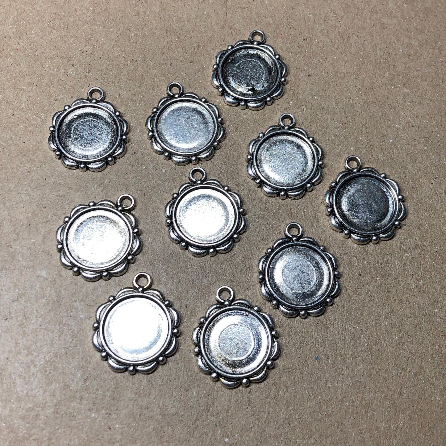 Ten bezel pendant charms