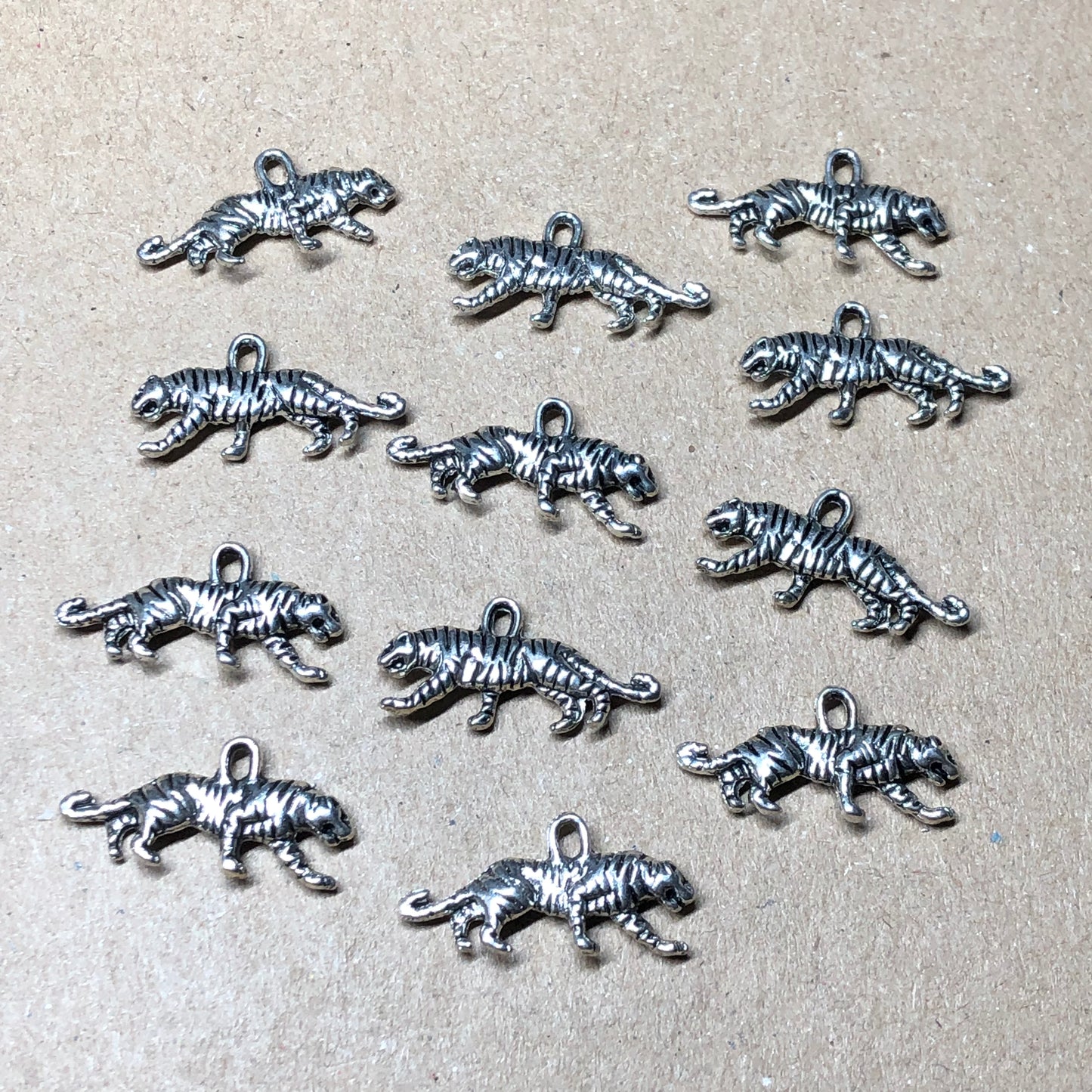 Twelve prowling tiger charms