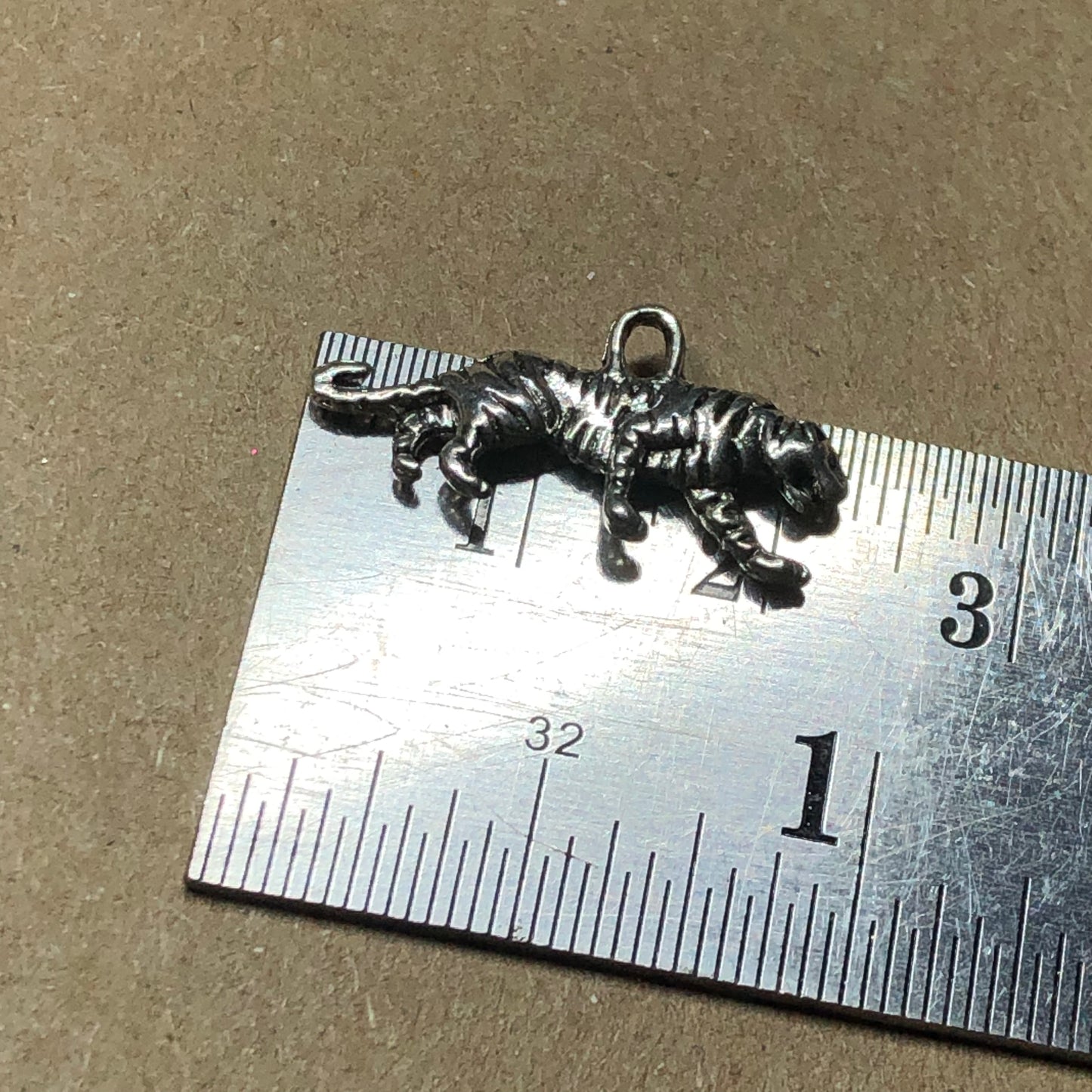 Twelve prowling tiger charms