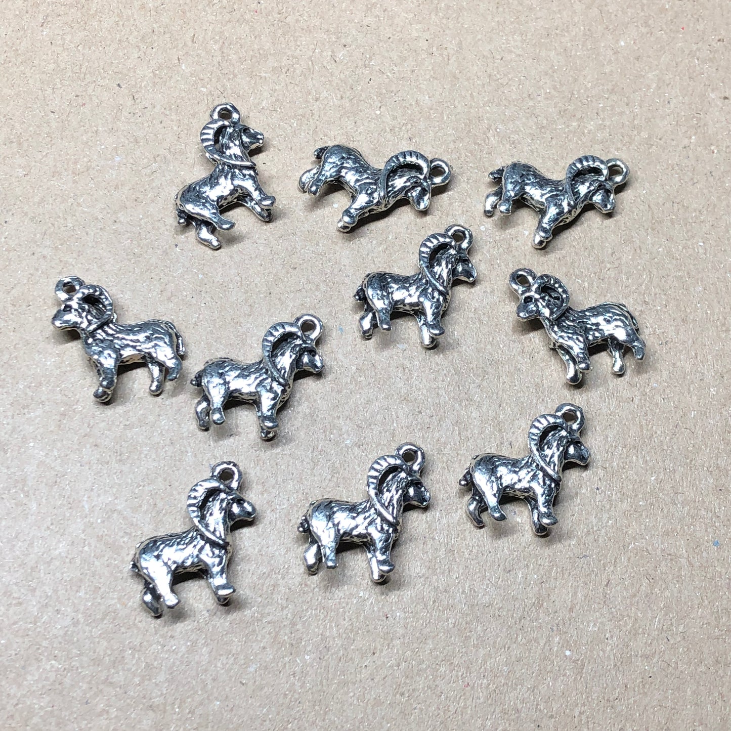 Ten goat Aries charms