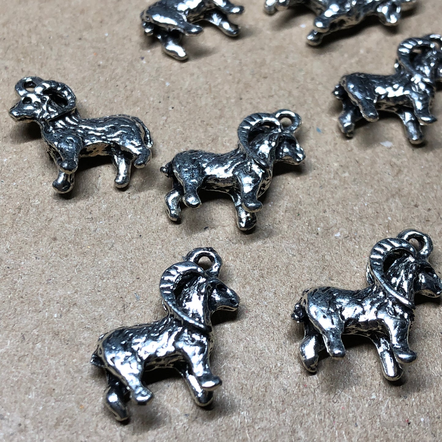 Ten goat Aries charms