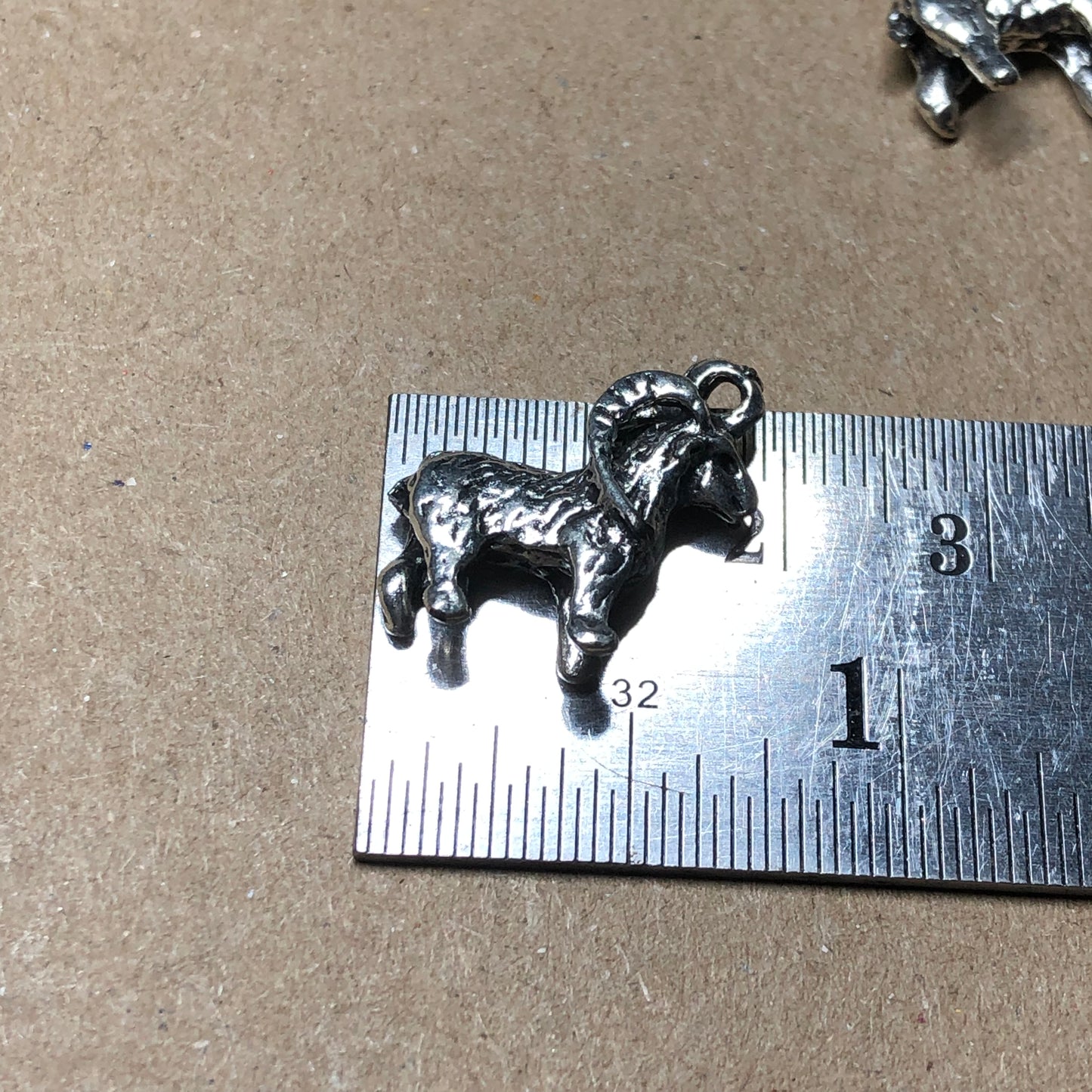 Ten goat Aries charms