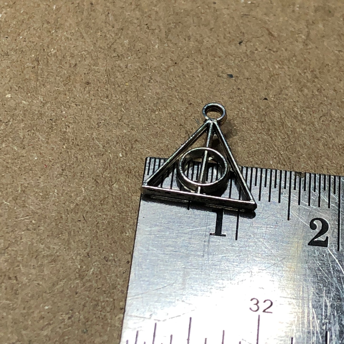 Twelve wizard symbol charms