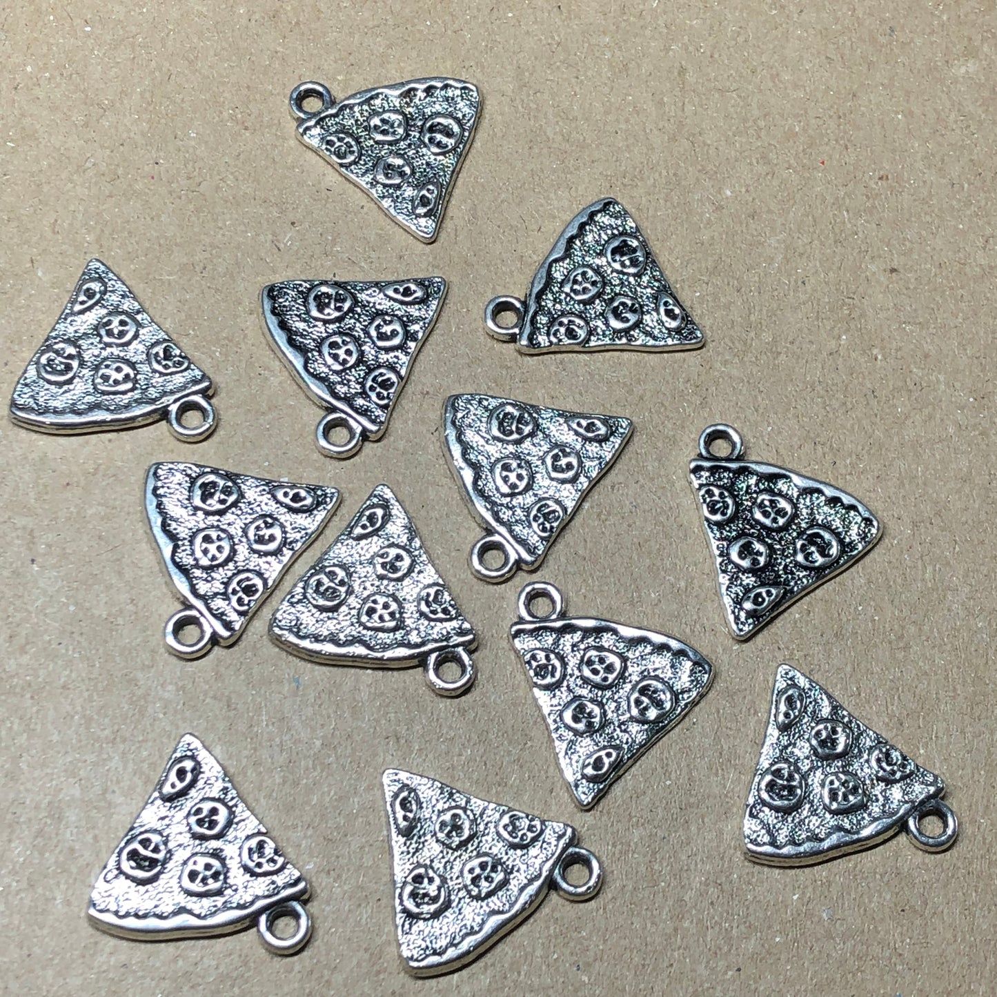 Twelve pizza slice charms