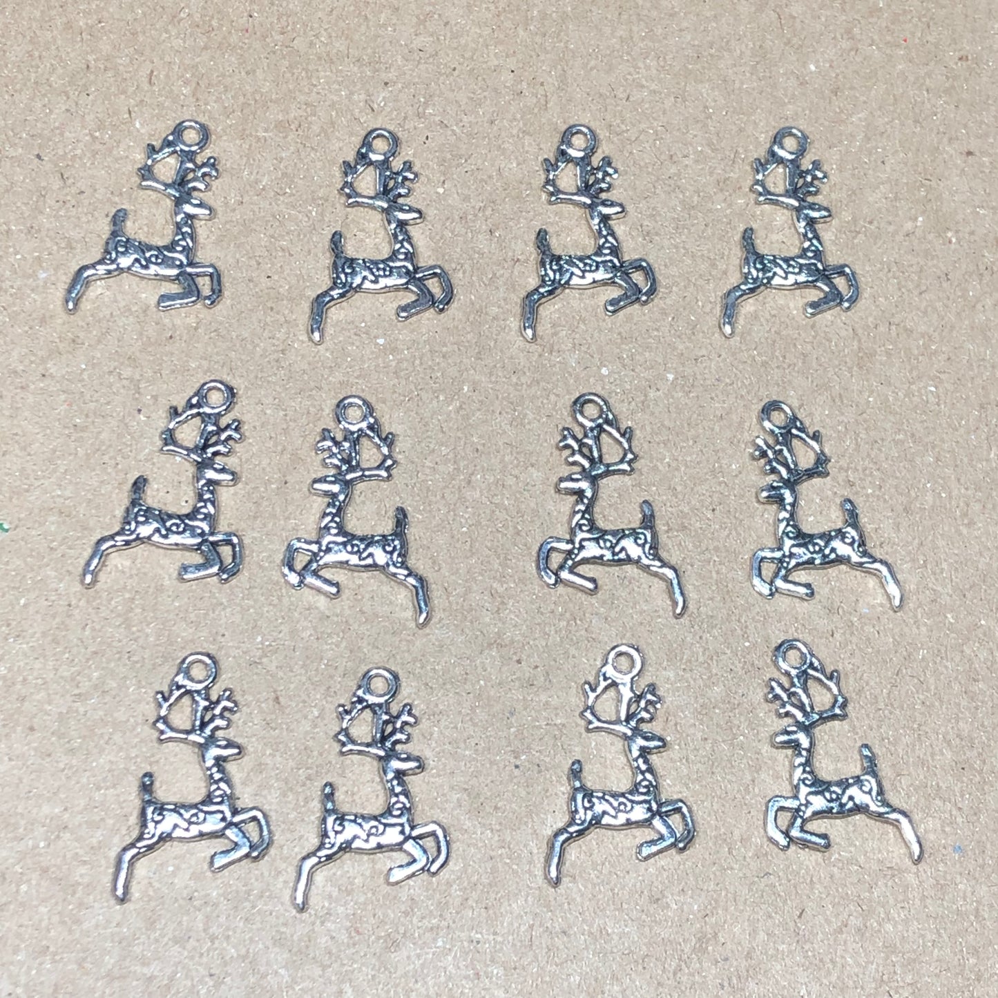 Twelve reindeer charms