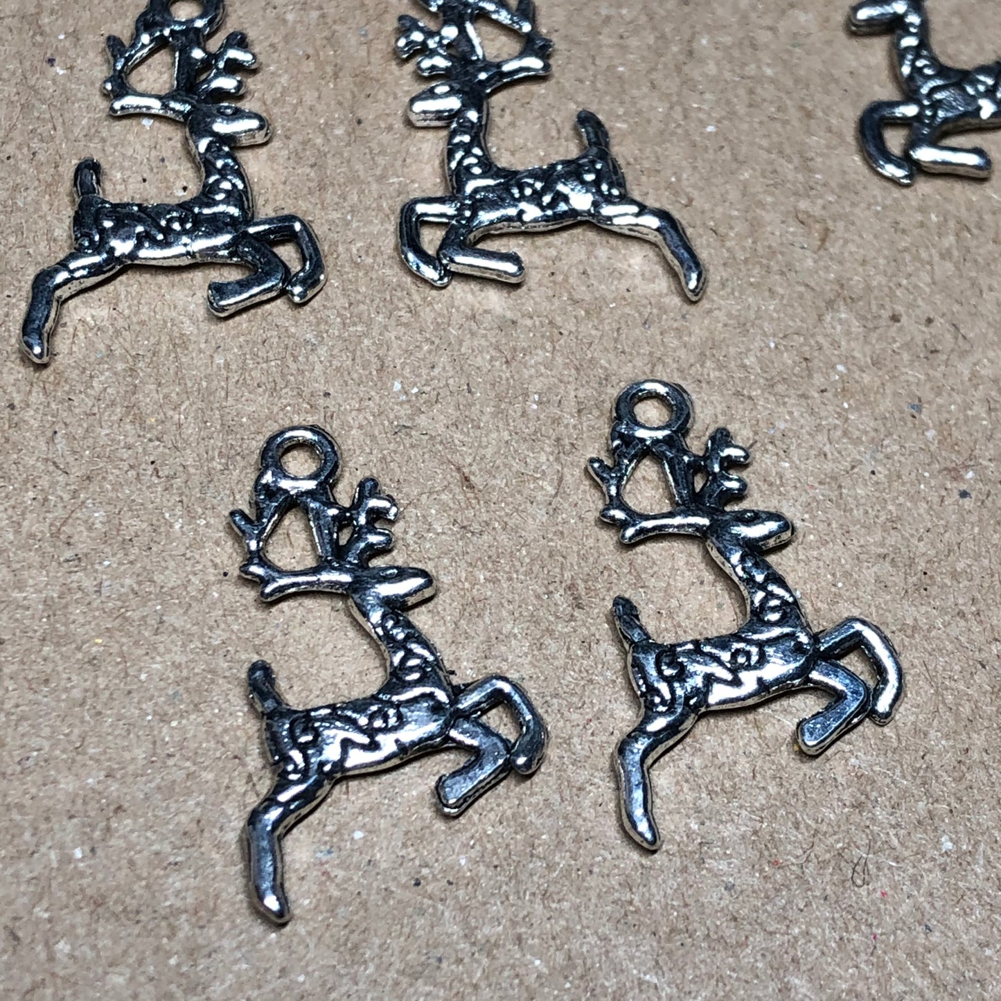 Twelve reindeer charms