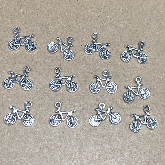 Twelve bicycle charms