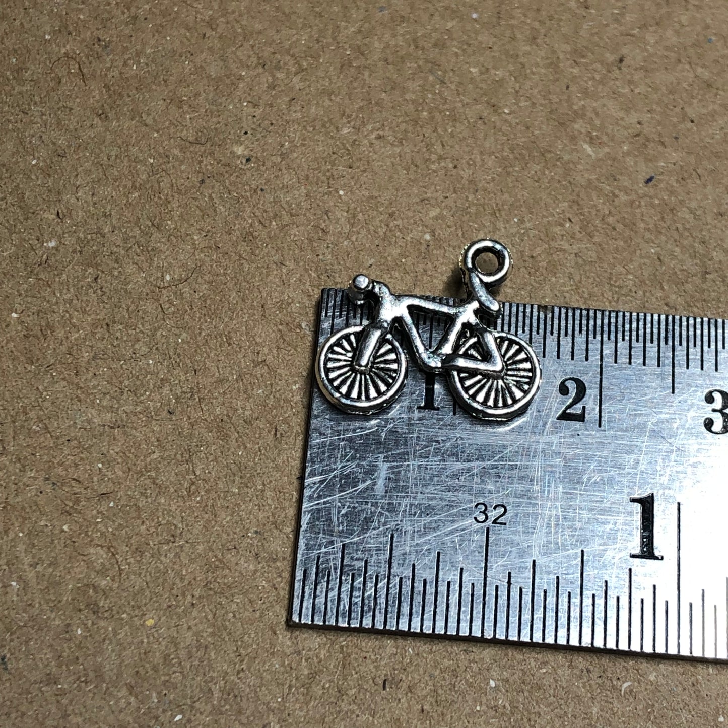 Twelve bicycle charms