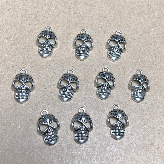 Ten creepy skull charms