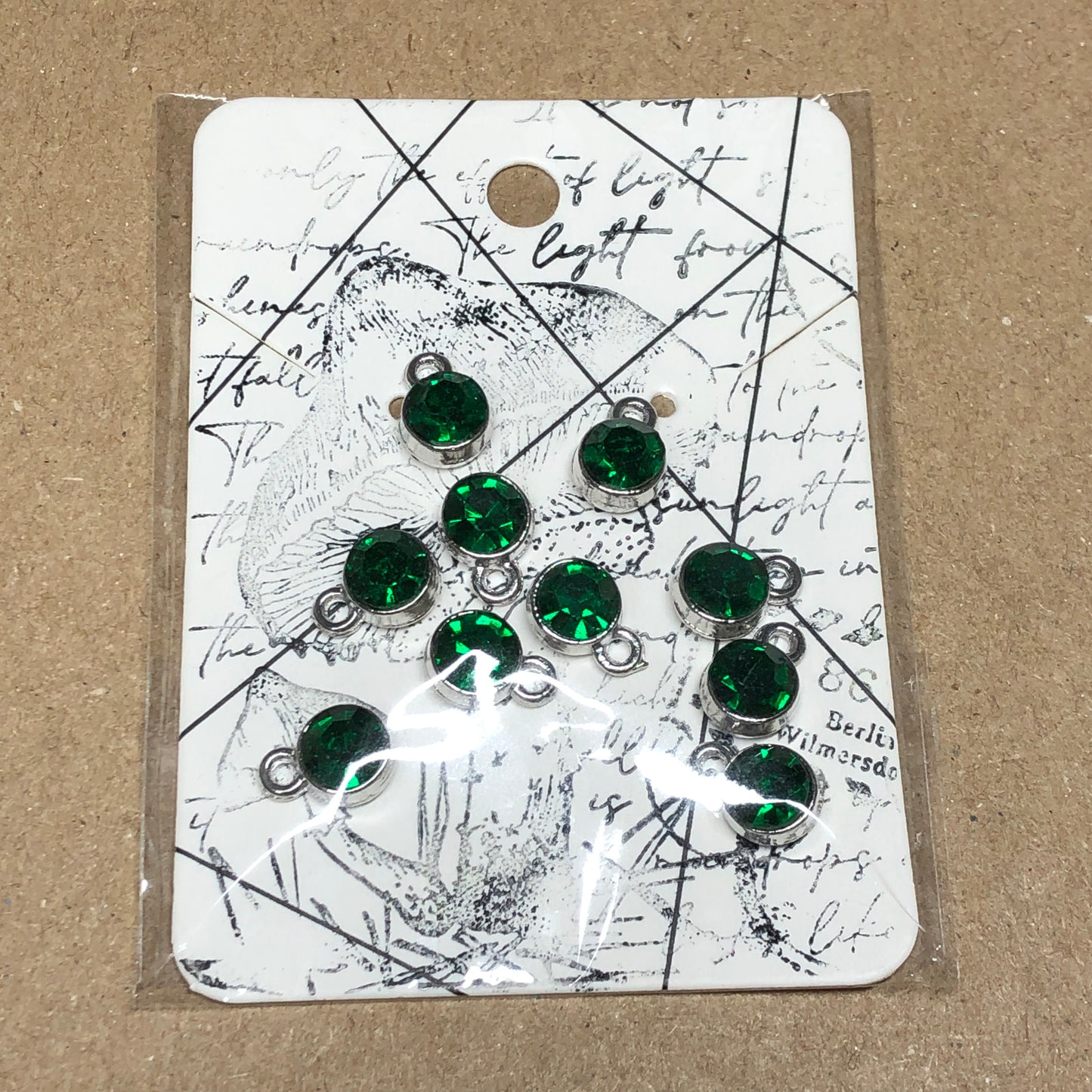 Ten emerald rhinestone pendant charms