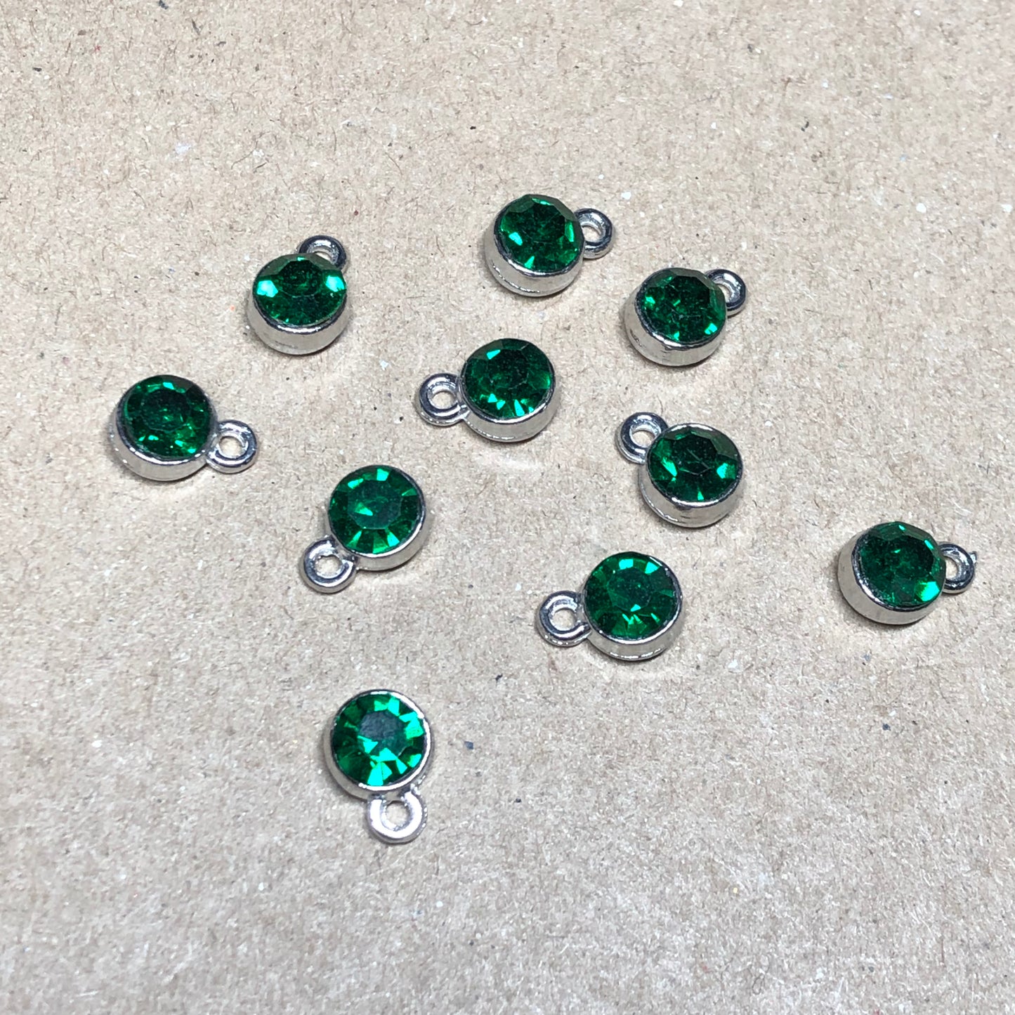 Ten emerald rhinestone pendant charms