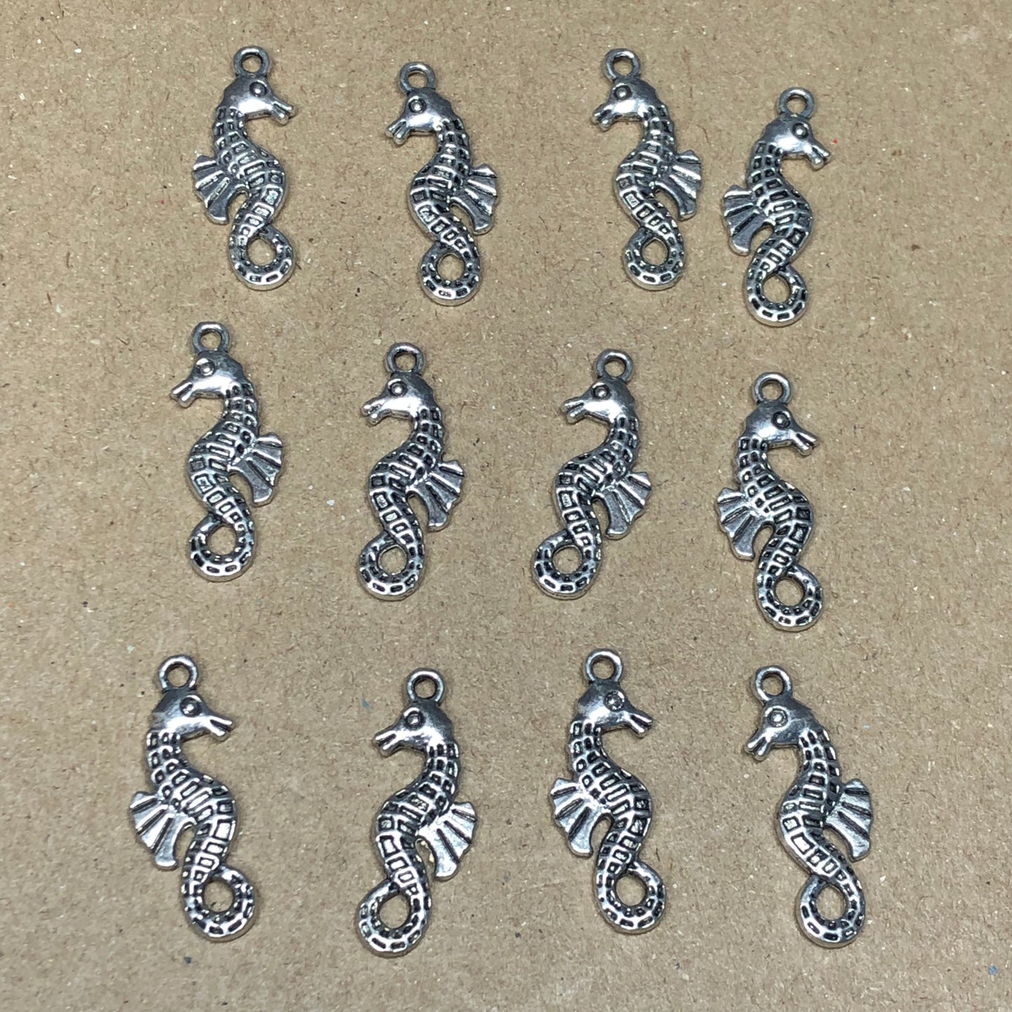 Twelve seahorse charms