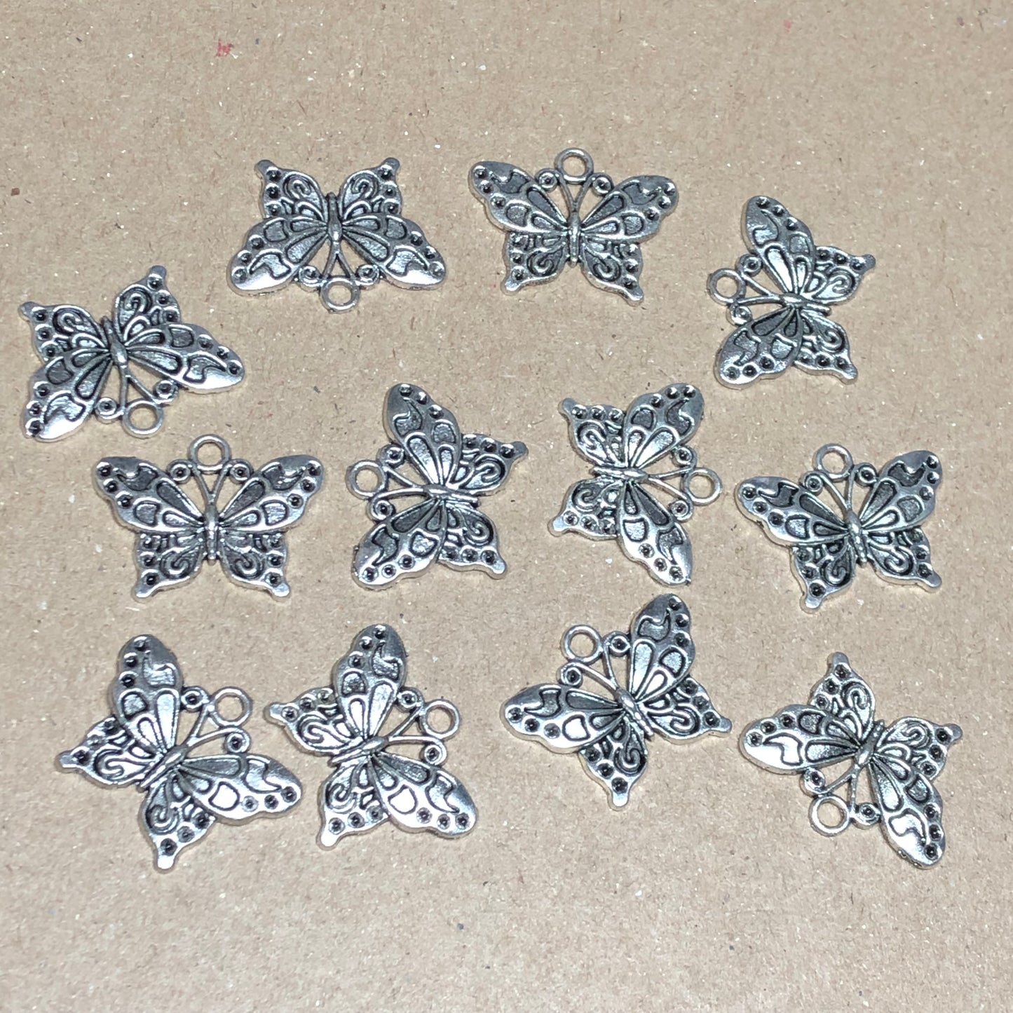 Twelve butterfly charms