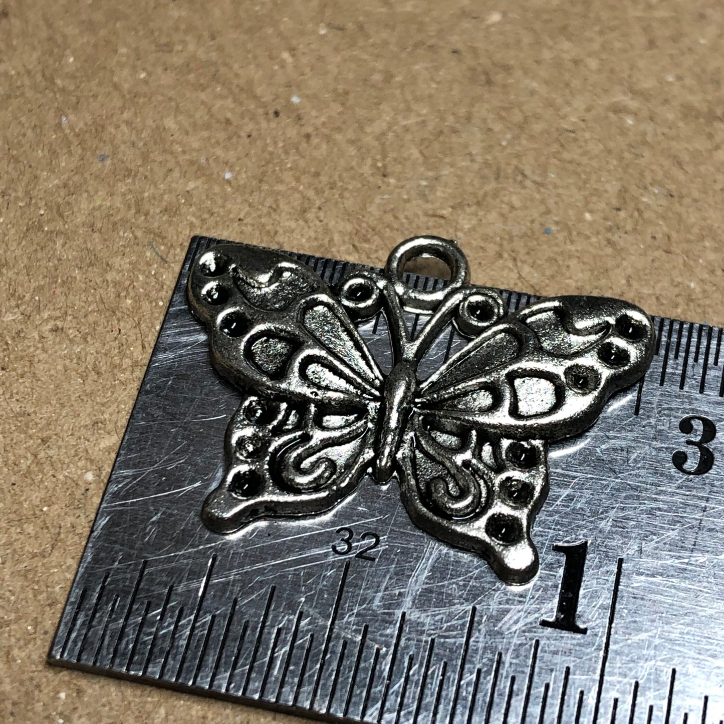 Twelve butterfly charms