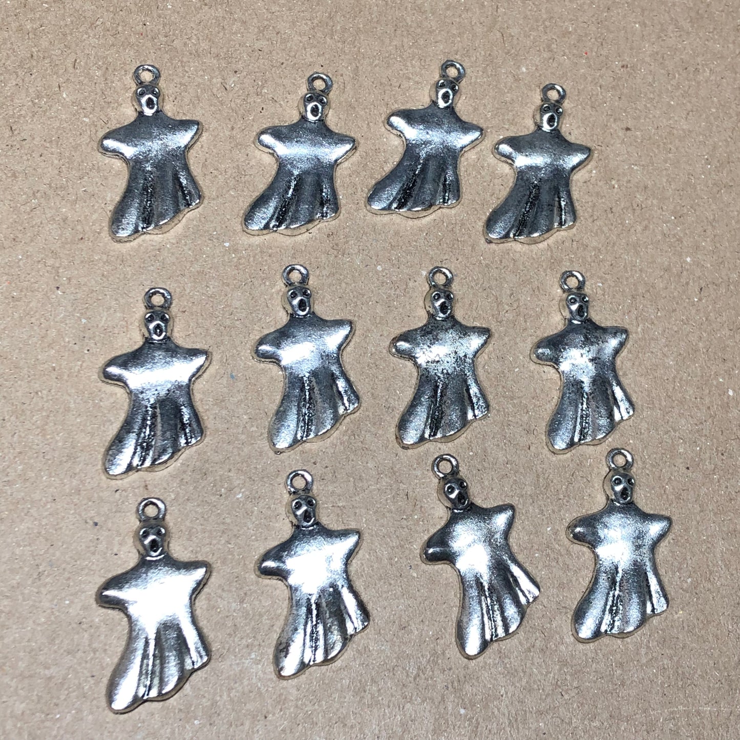 Twelve ghost charms