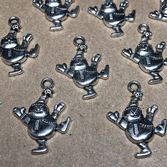 Twelve dancing snowman charms