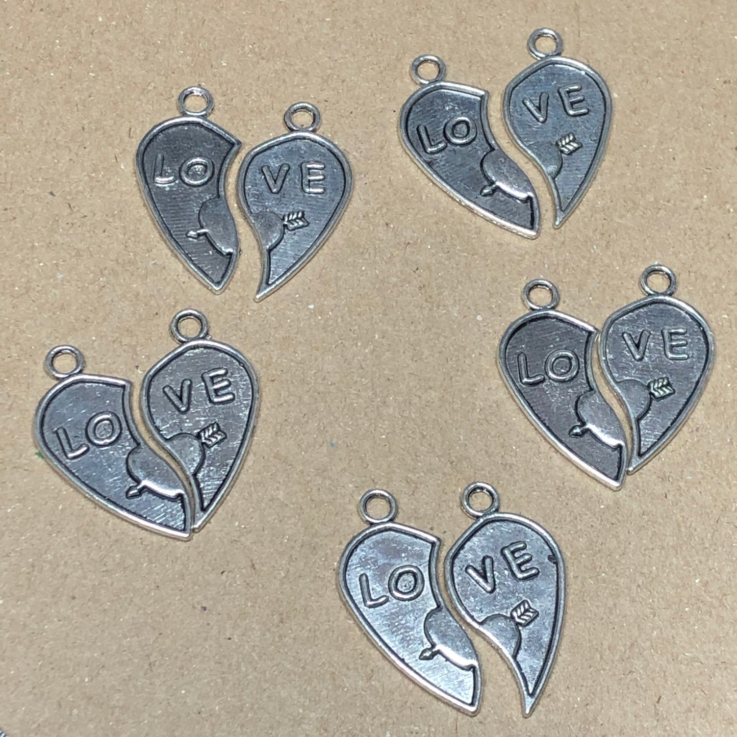 Five sets of love heart charms