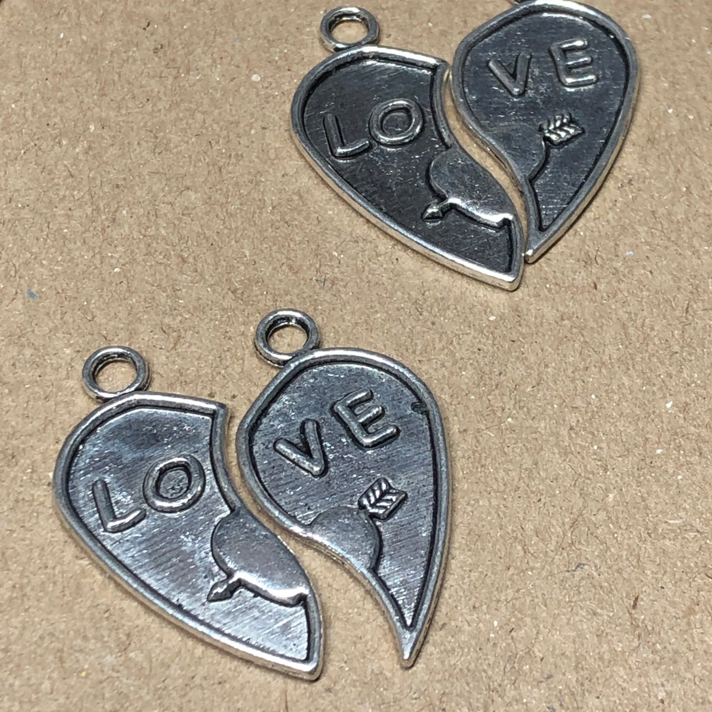 Five sets of love heart charms