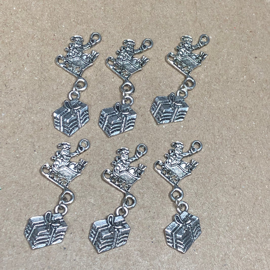 Six Santa, sleigh and gift charms