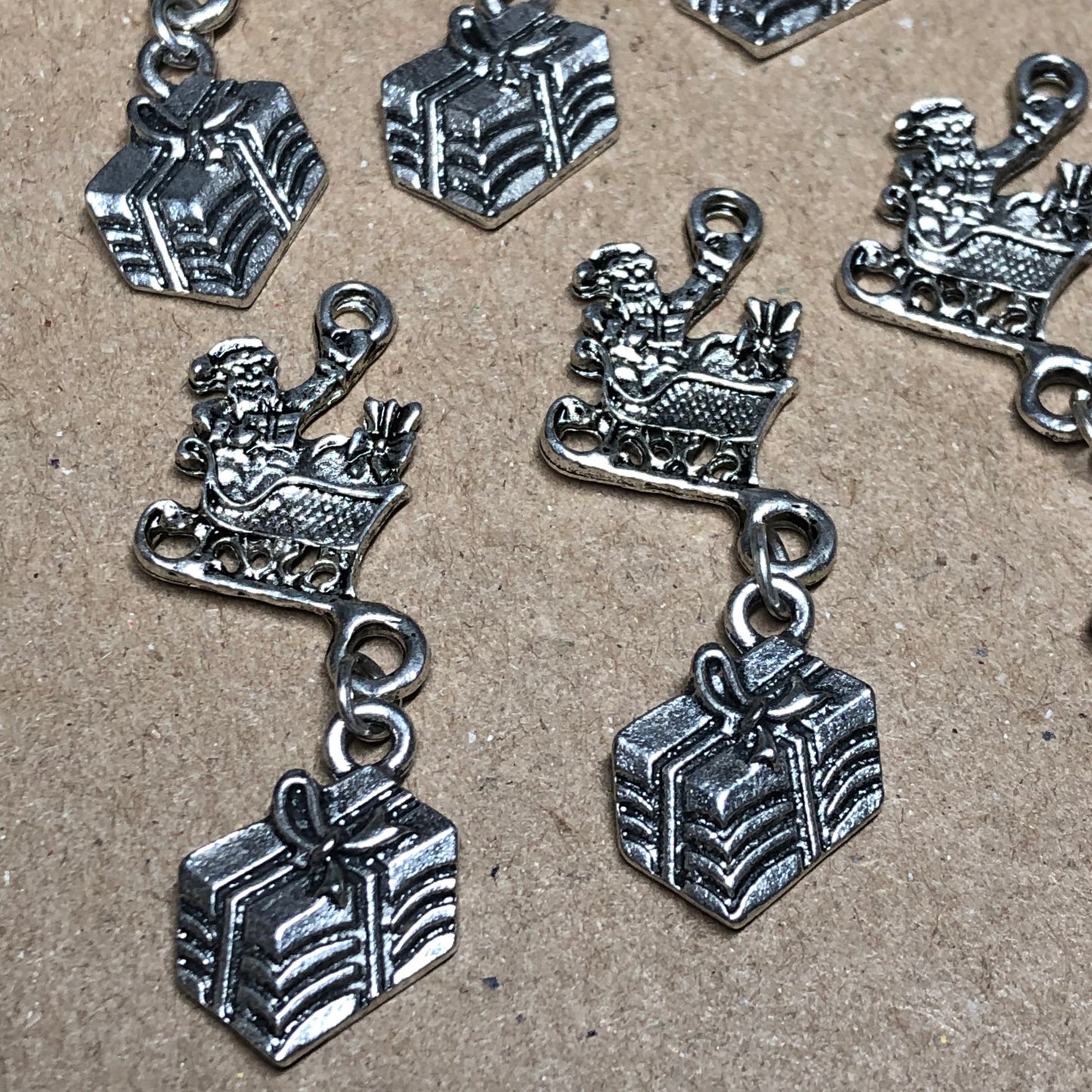 Six Santa, sleigh and gift charms