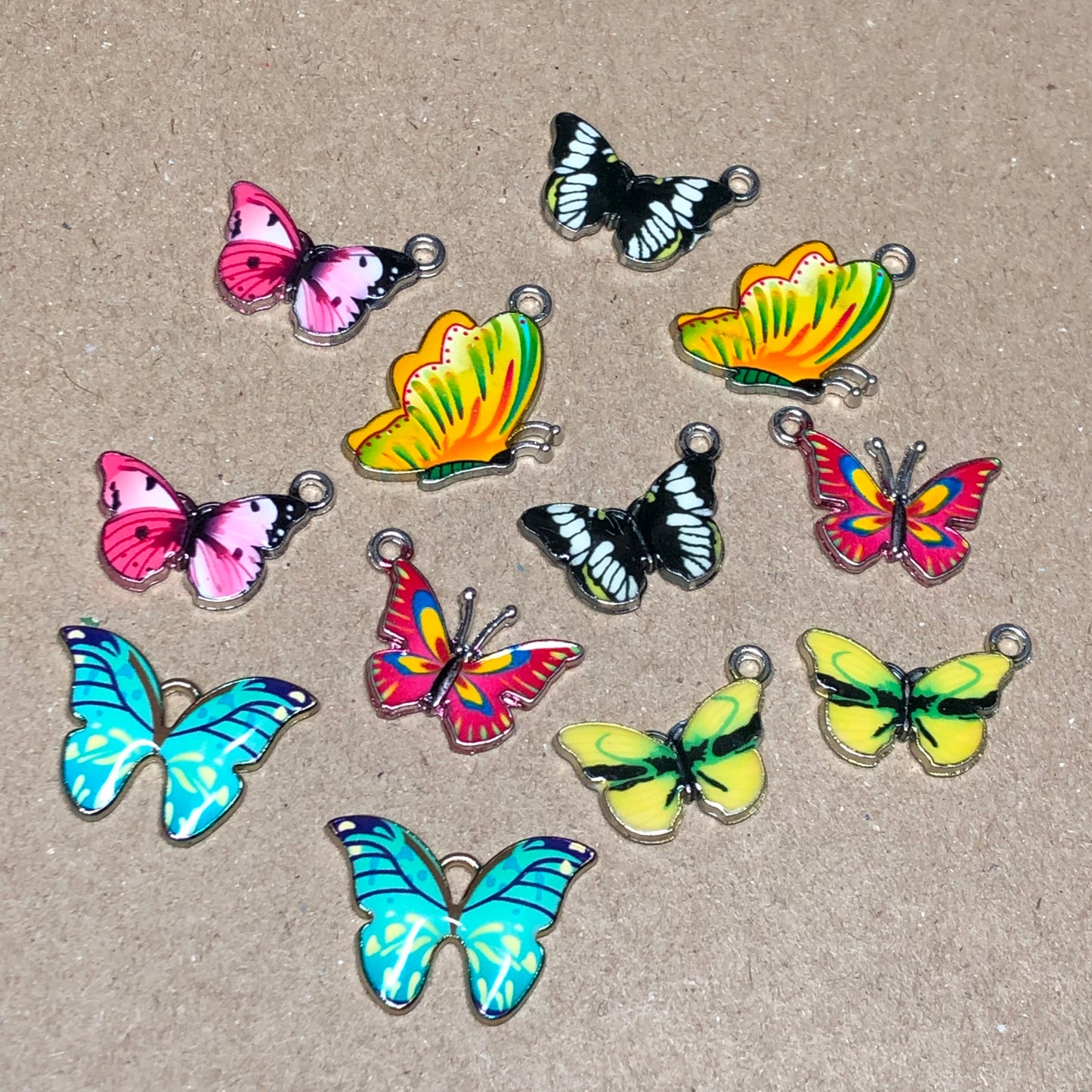 Twelve mixed colour butterfly charms