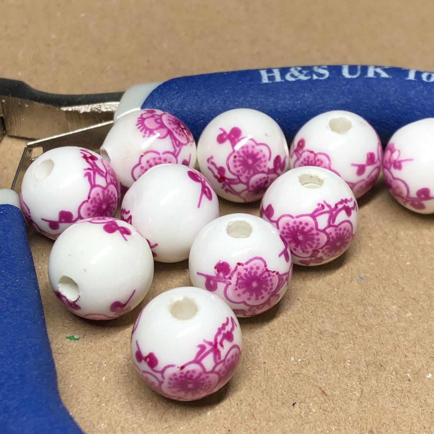 Mauve flower printed ceramic beads