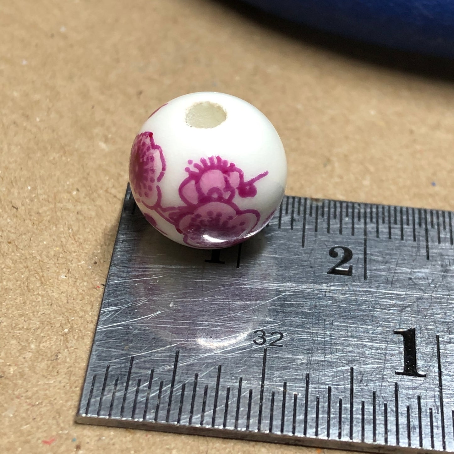 Mauve flower printed ceramic beads