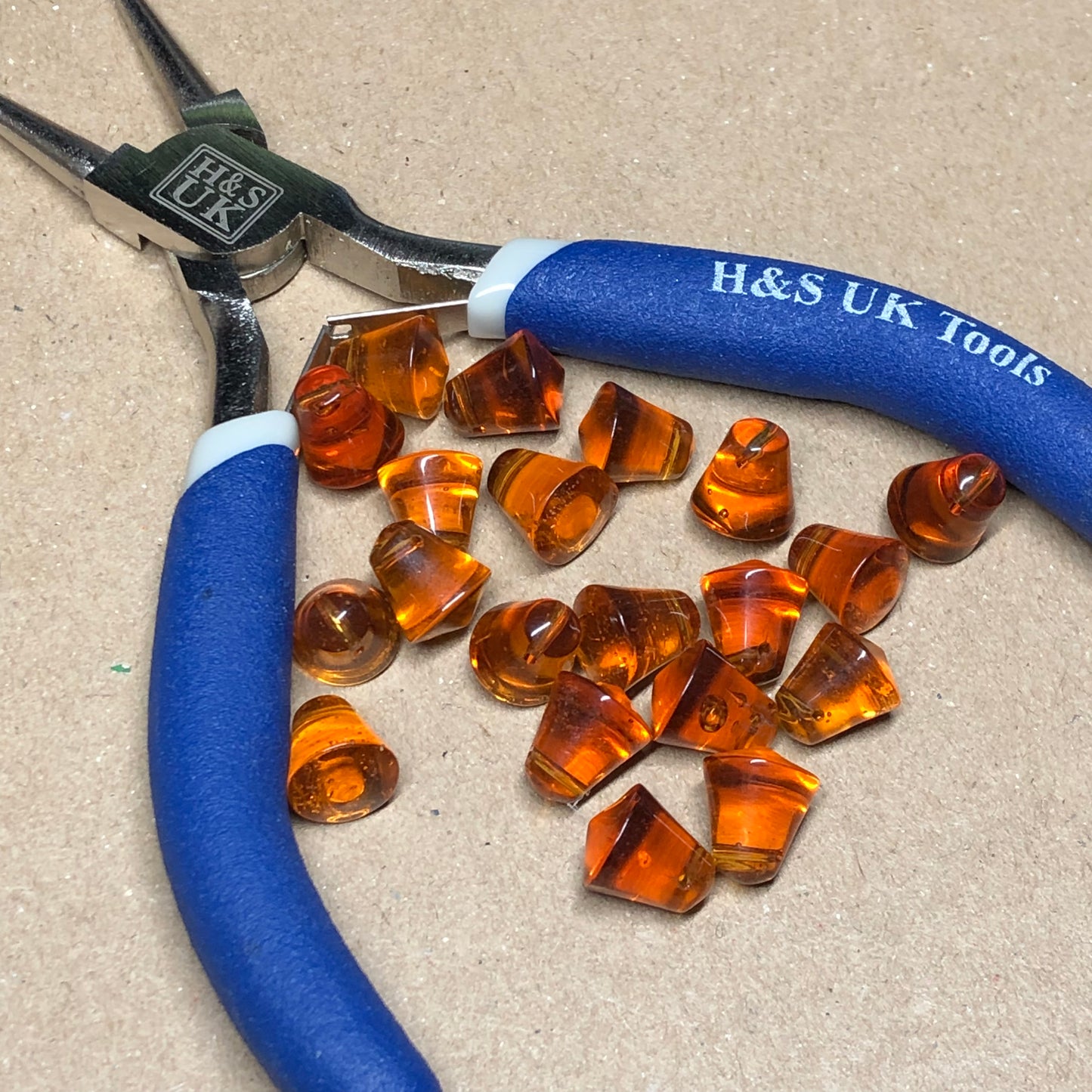 Amber glass cowbell beads