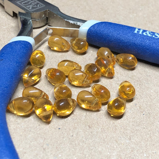 Yellow pear shaped glass beads