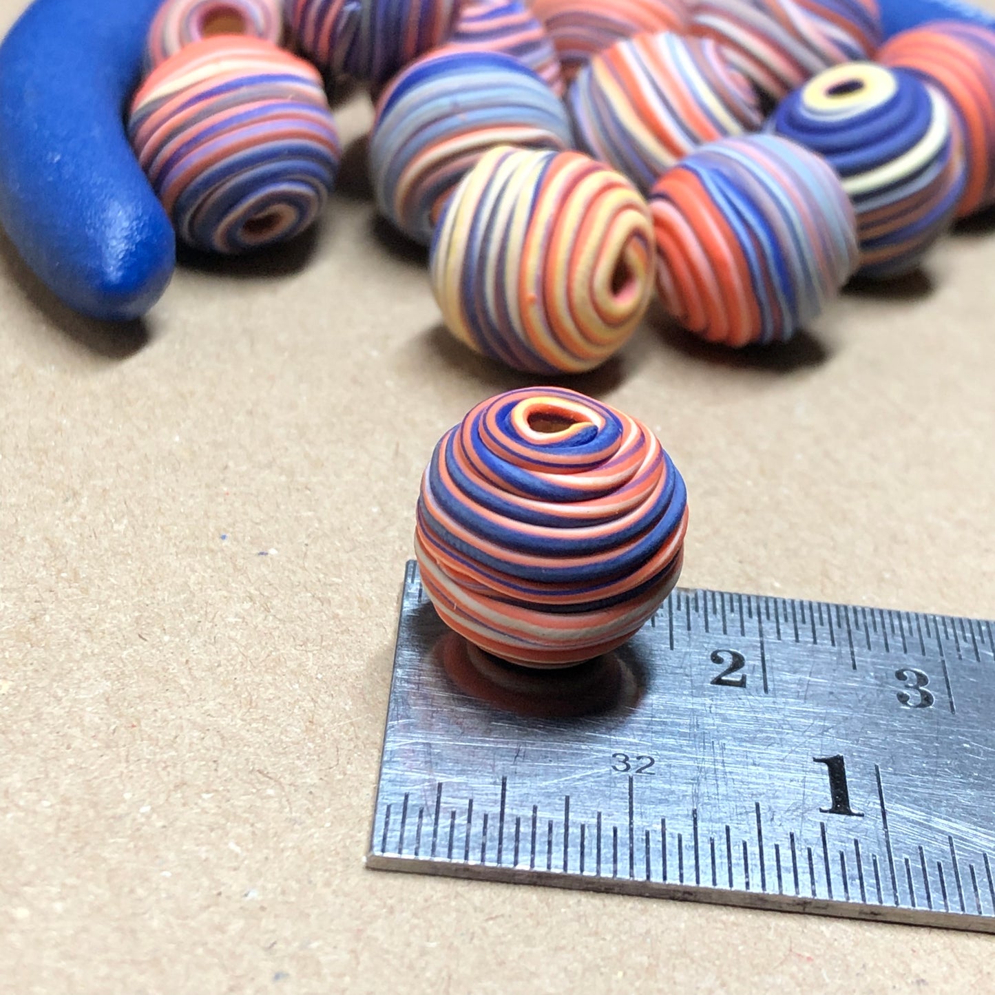 Purple and orange stripe beads