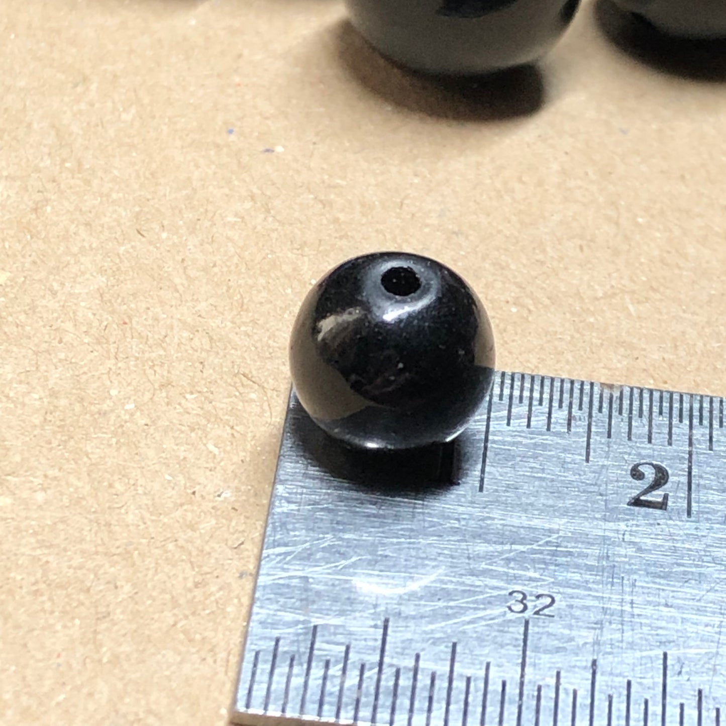 Black acrylic beads