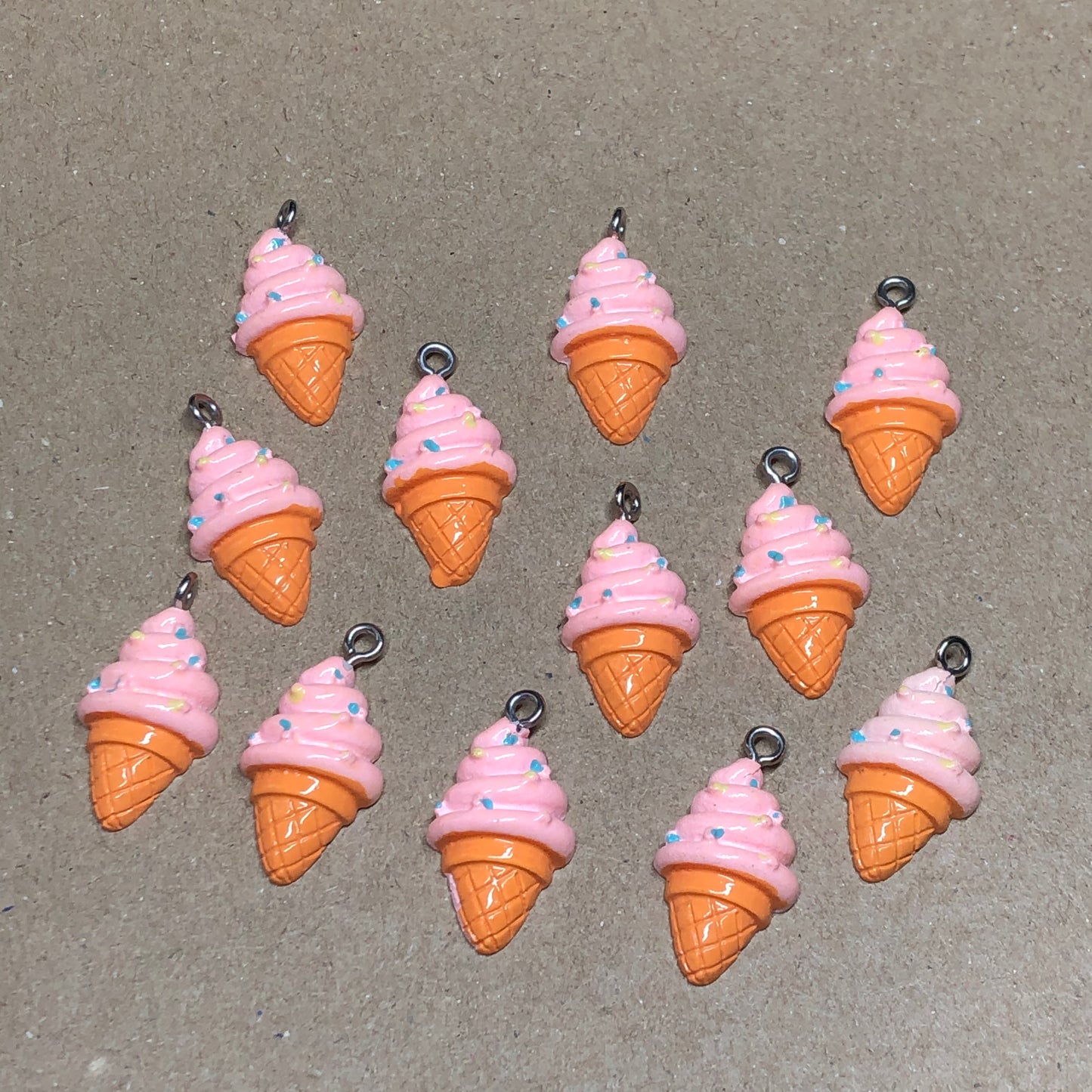 Twelve pink icecream cone charms