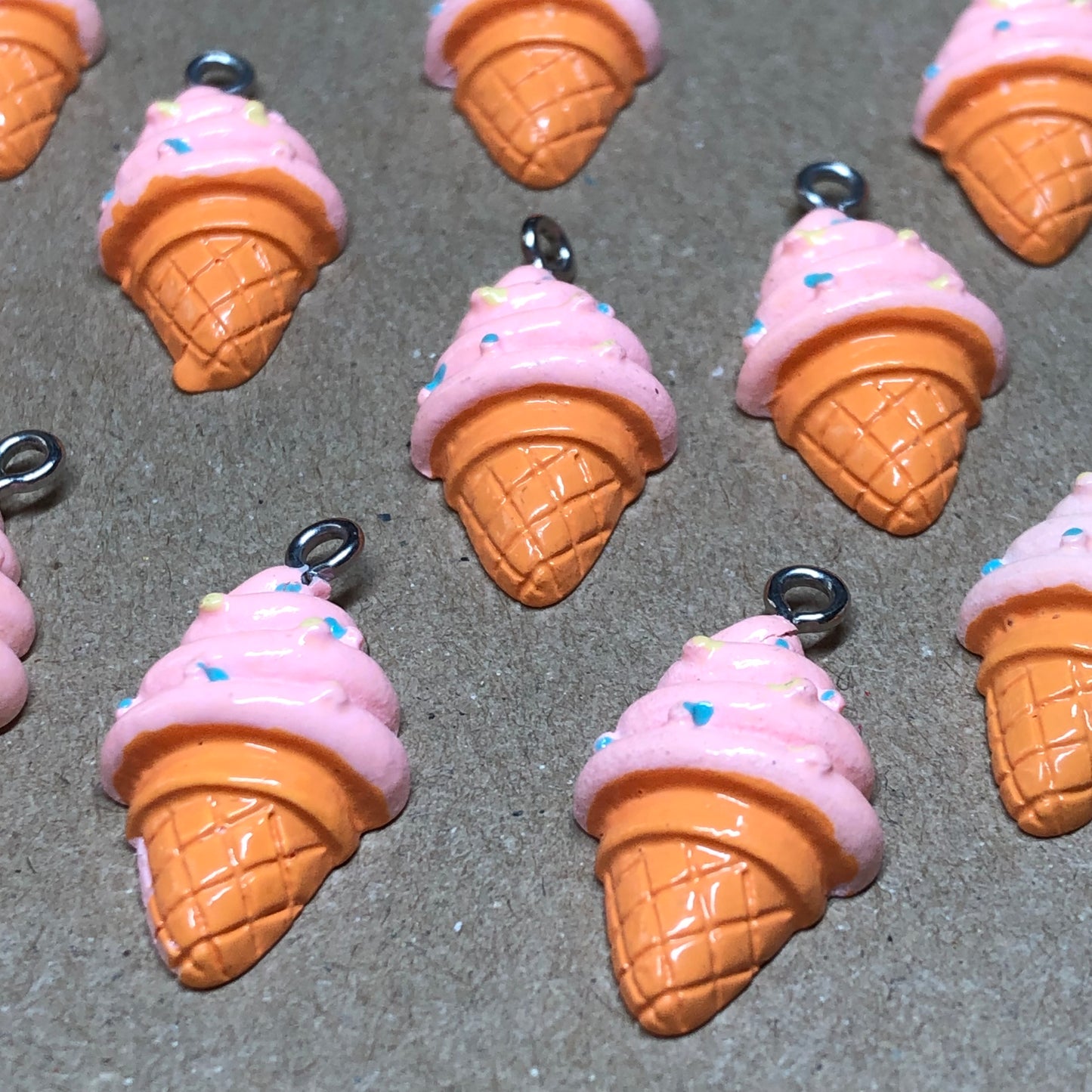 Twelve pink icecream cone charms