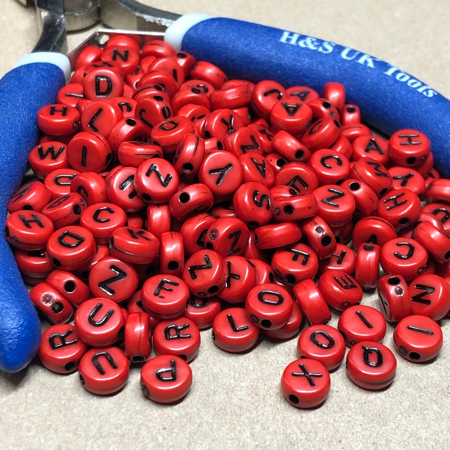 Red acrylic alphabet beads