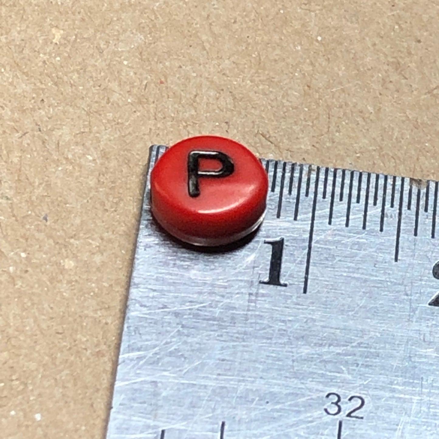 Red acrylic alphabet beads