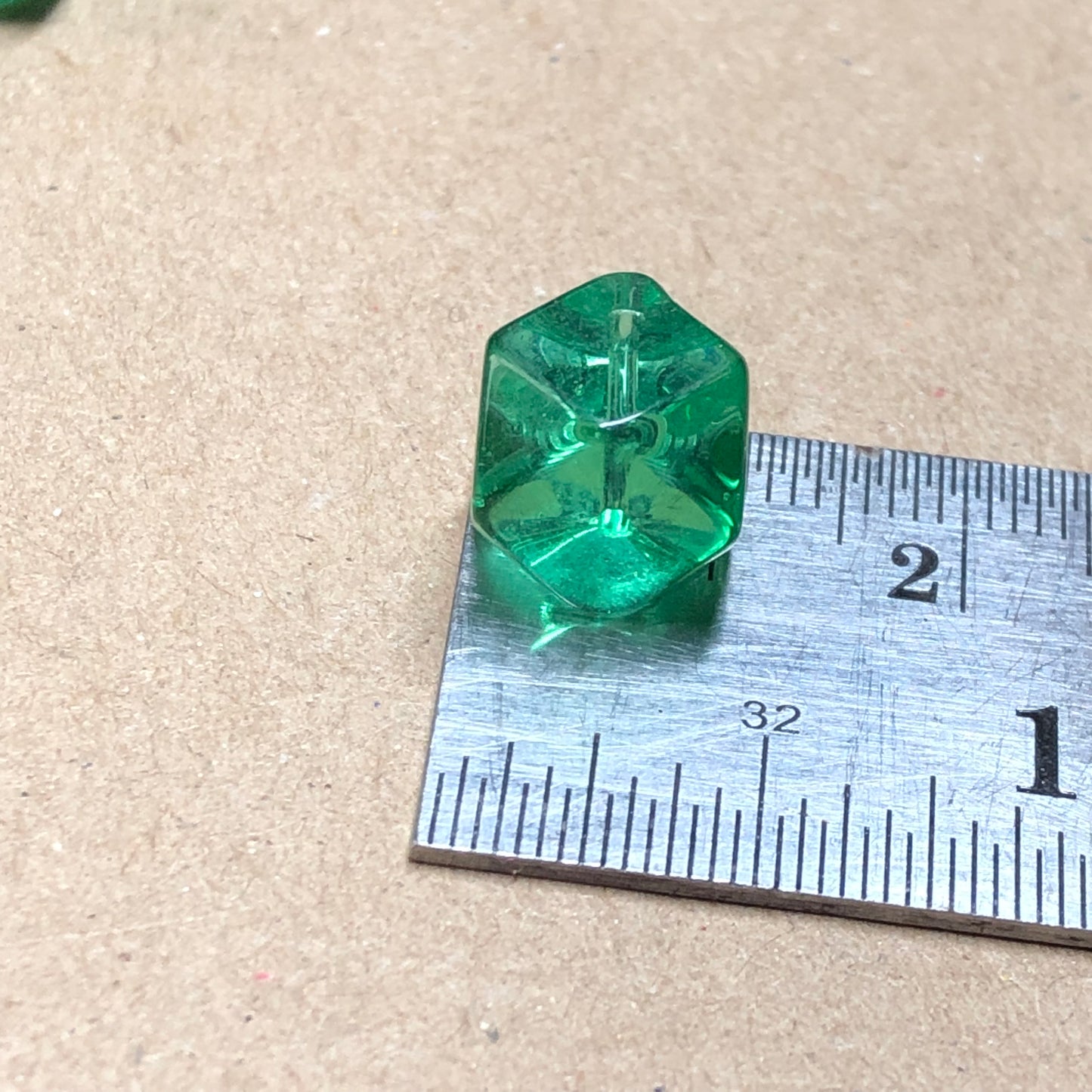 Green faceted cube shaped glass beads