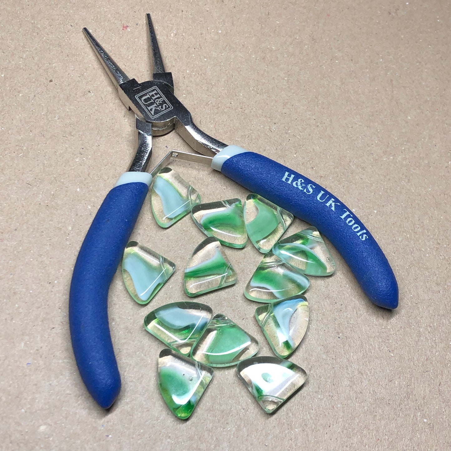 Green fan shaped glass beads